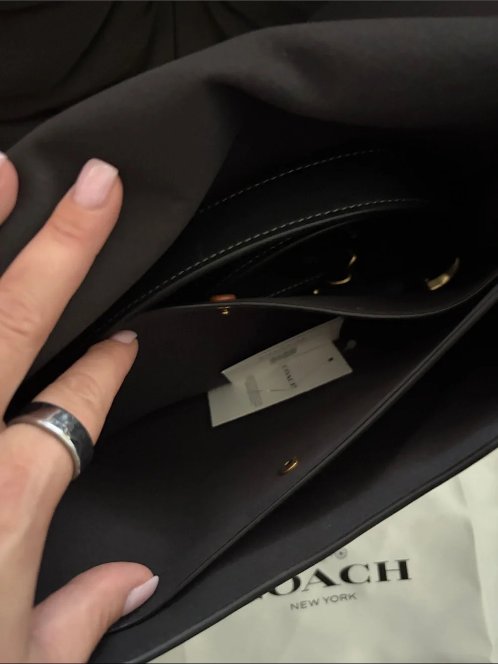 Coach sleek black